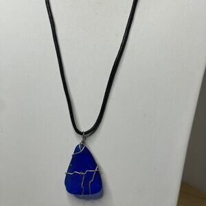 bright blue pendant necklace on black cord wire wrapped natural bohemian boho